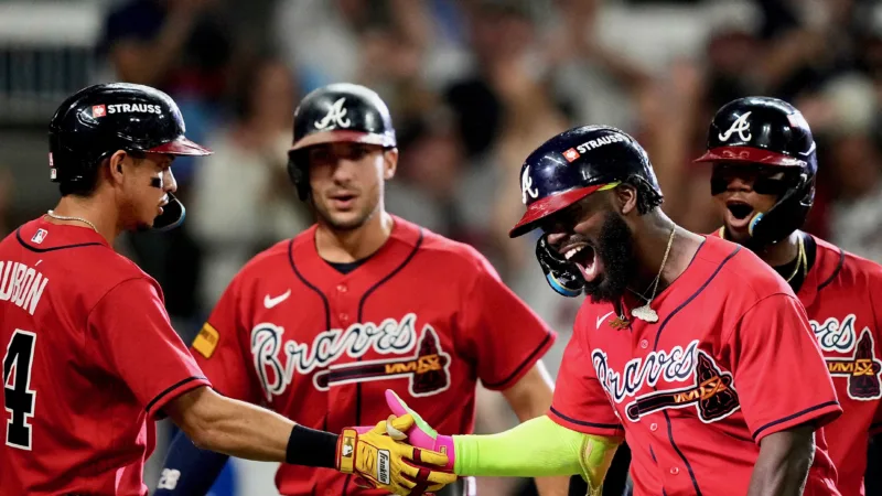 Braves hit 3 homers to eliminate Phillies